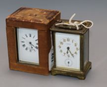 Two brass carriage timepieces