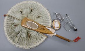 A Spanish fan, Scottish thistle pin, cameo and pince-nez