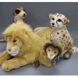 Four Steiff yellow tag toys: Molly Lion, Snuffi Lion, Bora Cheetah, and Mungo Meerkat