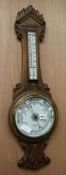 An aneroid barometer W.26cm