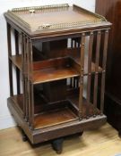 A mahogany revolving bookcase W.50cm