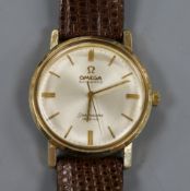 A gentleman's gold plated Omega Automatic Seamaster De Ville mid-size wrist watch, on associated