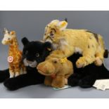 Four Steiff yellow tag toys: Manni Lynx, Gori Giraffe, Taky Panther and Rhino Hippo