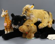 Four Steiff yellow tag toys: Manni Lynx, Gori Giraffe, Taky Panther and Rhino Hippo