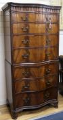 A George III style mahogany serpentine chest on chest W.88cm