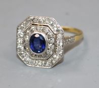 A 1940's/1950's 18ct gold, sapphire and diamond set octagonal cluster ring, size T.