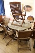 A teak garden table and 4 chairs W.109cm