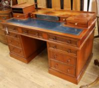 A 19th century mahogany kneehole desk W.150cm