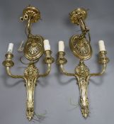 A pair of brass 2 branch putti sconces and another of rope designed sconces tallest 38cm