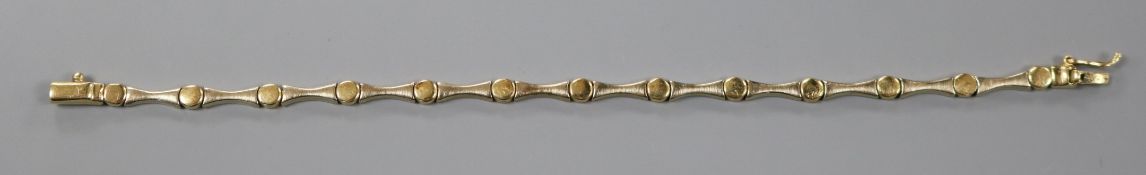 A modern two colour 585 yellow metal bracelet, 17cm.