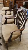 A set of six Hepplewhite style mahogany dining chairs