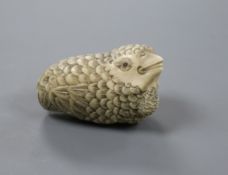 A Japanese ivory okimono of a quail