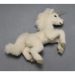 A Steiff unicorn, white tag and box with horn guard