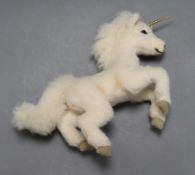 A Steiff unicorn, white tag and box with horn guard