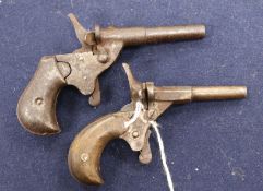 Two muff pistols, circa 1890