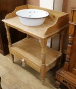 A Victorian pine wash stand with ceramic bowl W.77cm