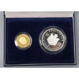 A boxed Liechtenstein silver 10 franc and gold 50 franc coin.