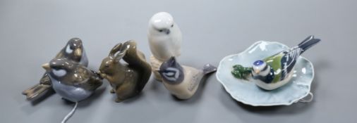 A collection of Royal Copenhagen birds and animals and a frog on lilypad dish