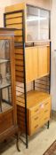 Robert Heals for Staples, Ladderlax single bay shelving system: 3 cabinets: one 3-door with key, one