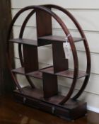 A Chinese hardwood circular shelf stand W.51cm