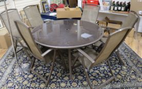A garden table and six chairs W.149.5cm
