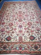 A Tabriz ivory ground carpet 338 x 240cm