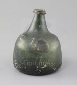 An olive green transitional onion / mallet shaped wine bottle, sealed J. Kennan 1725, height 15cm,