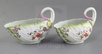A pair of Derby leaf-moulded sauceboats, c.1758, each painted in 'Cotton-Stem' style with loose