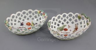 A pair of Derby botanical oval 'spectacle' baskets, c.1760-5, the interior painted with a cherry