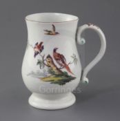 A Derby baluster-shaped mug, c.1760, painted with two exotic birds perched on branches, another in
