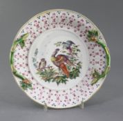 A rare Derby circular chestnut basket stand, c.1758, painted with an owl and two exotic birds amid