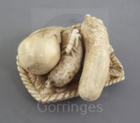 A Japanese ivory netsuke of vegetables on a woven tray, Meiji period, signed Komei, l. 3.7cm