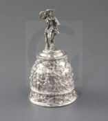 A late Victorian cast silver hand bell by Aldwinckle & Slater, decorated with continuous scene of