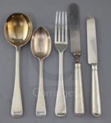 A George V part canteen of silver Old English fancy feather edge pattern cutlery by Mappin & Webb,