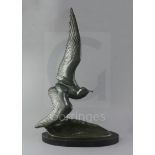 Irénée Rochard (1906-1984). A French Art Deco green patinated bronze model of a seagull flying
