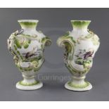 A pair of Derby rococo vases, c.1758-60, each cartouche painted with birds, the reverse with a '
