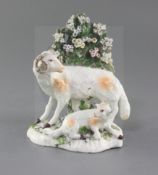 A Derby group of sheep, c.1760-5, the figure of a ram standing before bocage with a lamb at is feet,