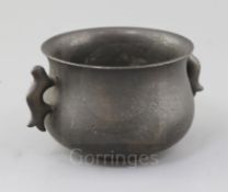 A Chinese bronze baluster shaped censer, Gui, Qing dynasty, with a pair of fish shaped handles,