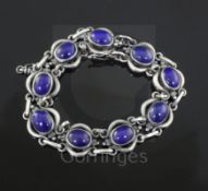 A Danish Georg Jensen sterling silver and cabochon lapis lazuli set bracelet, no. 10, 1915-1927