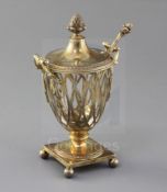 A George V silver gilt two handled sugar vase and matching sifter spoon, by Mappin & Webb, of vase