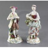 A pair of Derby figures of Liberty and Matrimony, c.1760, each standing by a flowering tree stump,