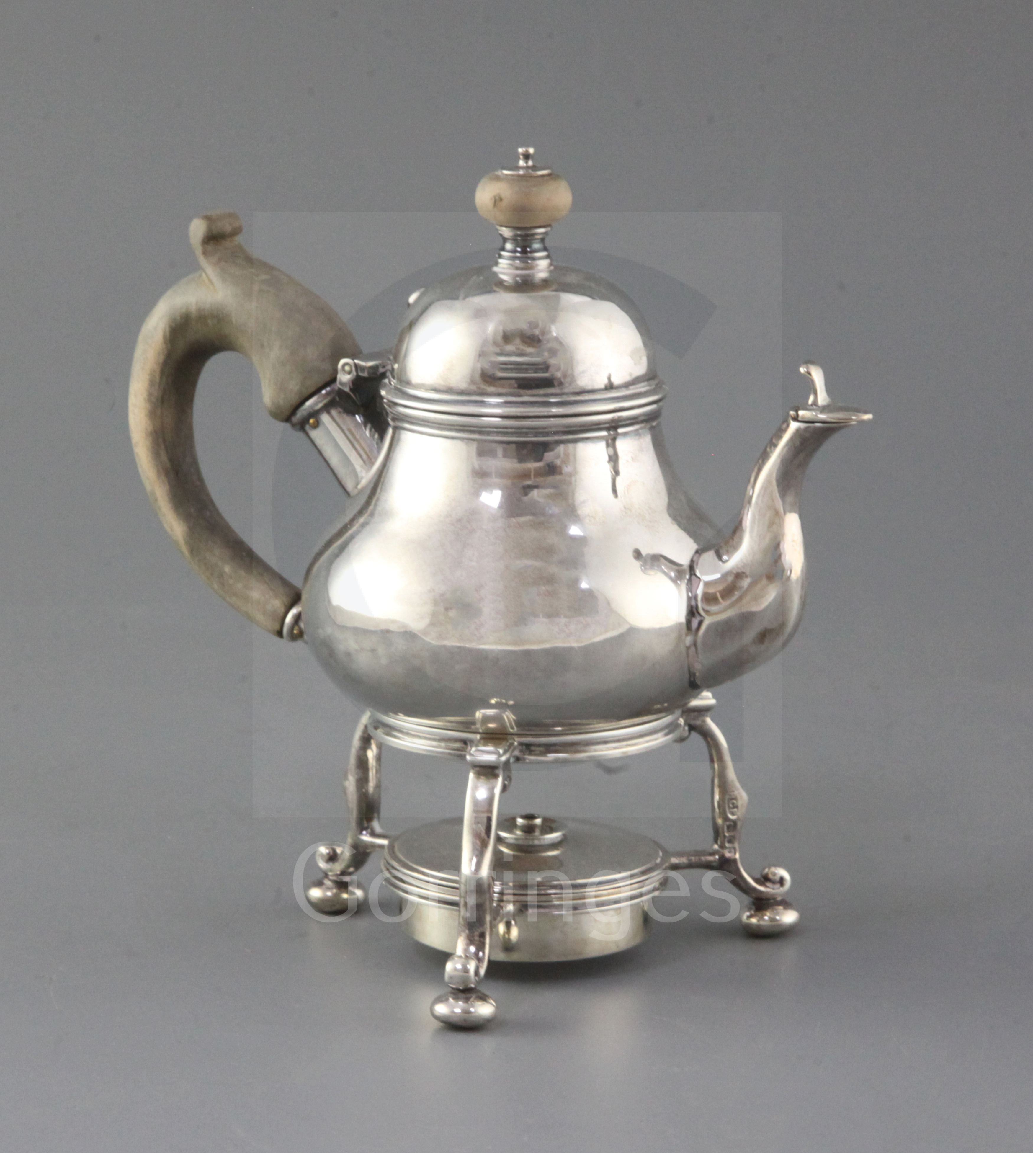 A 1980's Queen Anne style silver spirit kettle, on tripod stand with burner, by Rodney C. Pettit, of