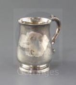 A George II provincial silver mug by John Elston Junior, of baluster form, with engraved initials