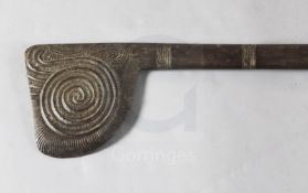 A Maori carved hardwood tewhatewha club, New Zealand, with notched spiral decoration to blade and