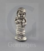 A late Victorian novelty silver vesta case modelled as a baby wrapped in swaddling clothes, import