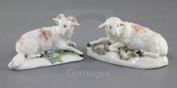 A matched pair of Derby figures of a ram and a ewe, c.1760-5, each recumbent on a shaped mound