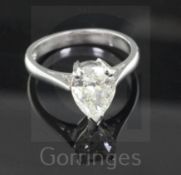 A modern platinum and solitaire pear cut diamond ring, the stone weighing approximately 2.00cts,