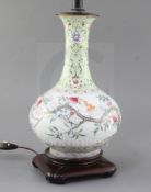 A Chinese famille rose 'nine peach' bottle vase, Qing dynasty, finely painted with nine peach