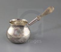 A George III silver brandy pan by Peter & Ann Bateman, of baluster form, with turned wooden