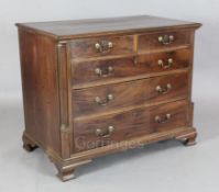 A George III mahogany chest, of two short and three graduated long drawers, on ogee feet, W.3ft 2in.